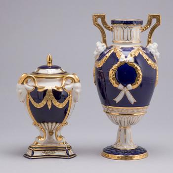 A ROYAL DUX PORCELAIN VASE AND LIDDED URN, 20th century.