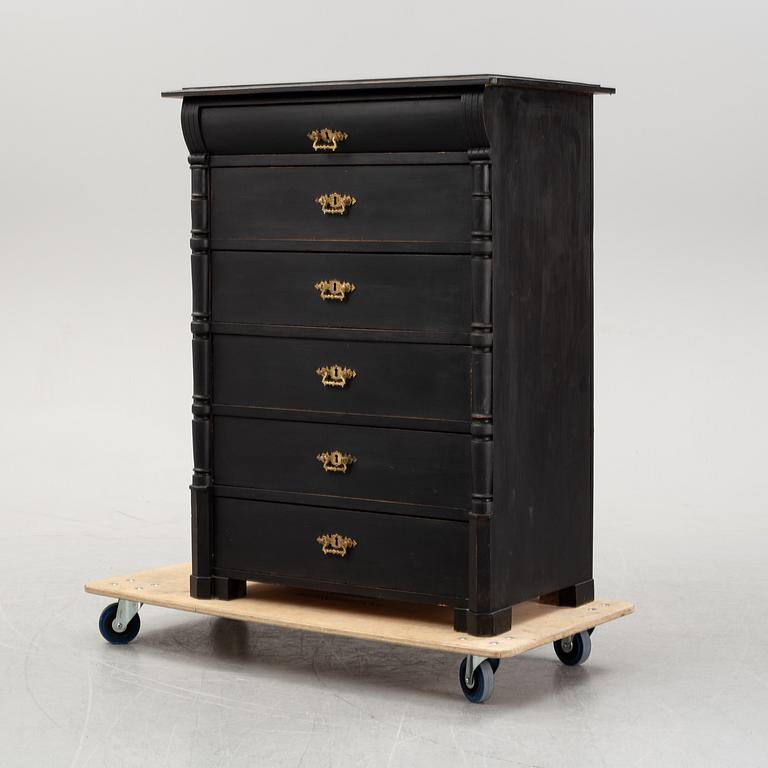 A painted chest of drawers, circa 1900.
