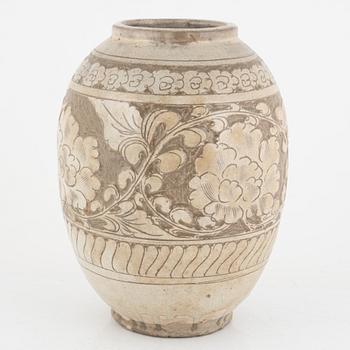 A Chinese glazed stoneware jar, probably Ming dynasty (1368–1644).