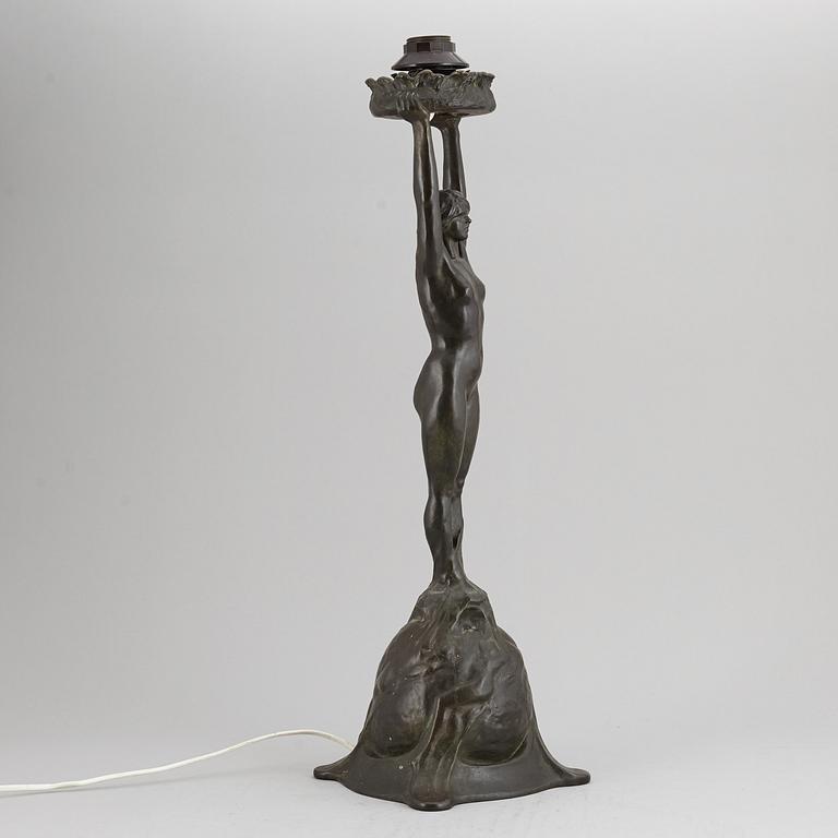 GERDA SPRINCHORN, an Art Nouveau green patinated bronze lamp "The Sun", Herman Bergman, Stockholm, early 20th century.