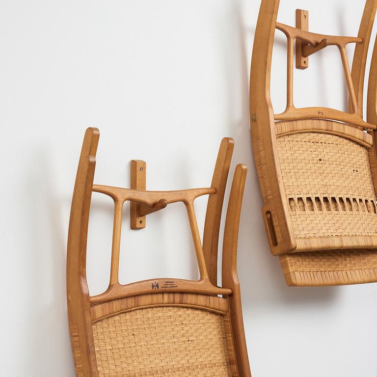 Hans J. Wegner, a pair of model 512 oak 'Folding Chairs' executed by Johannes Hansen, Denmark 1950's.