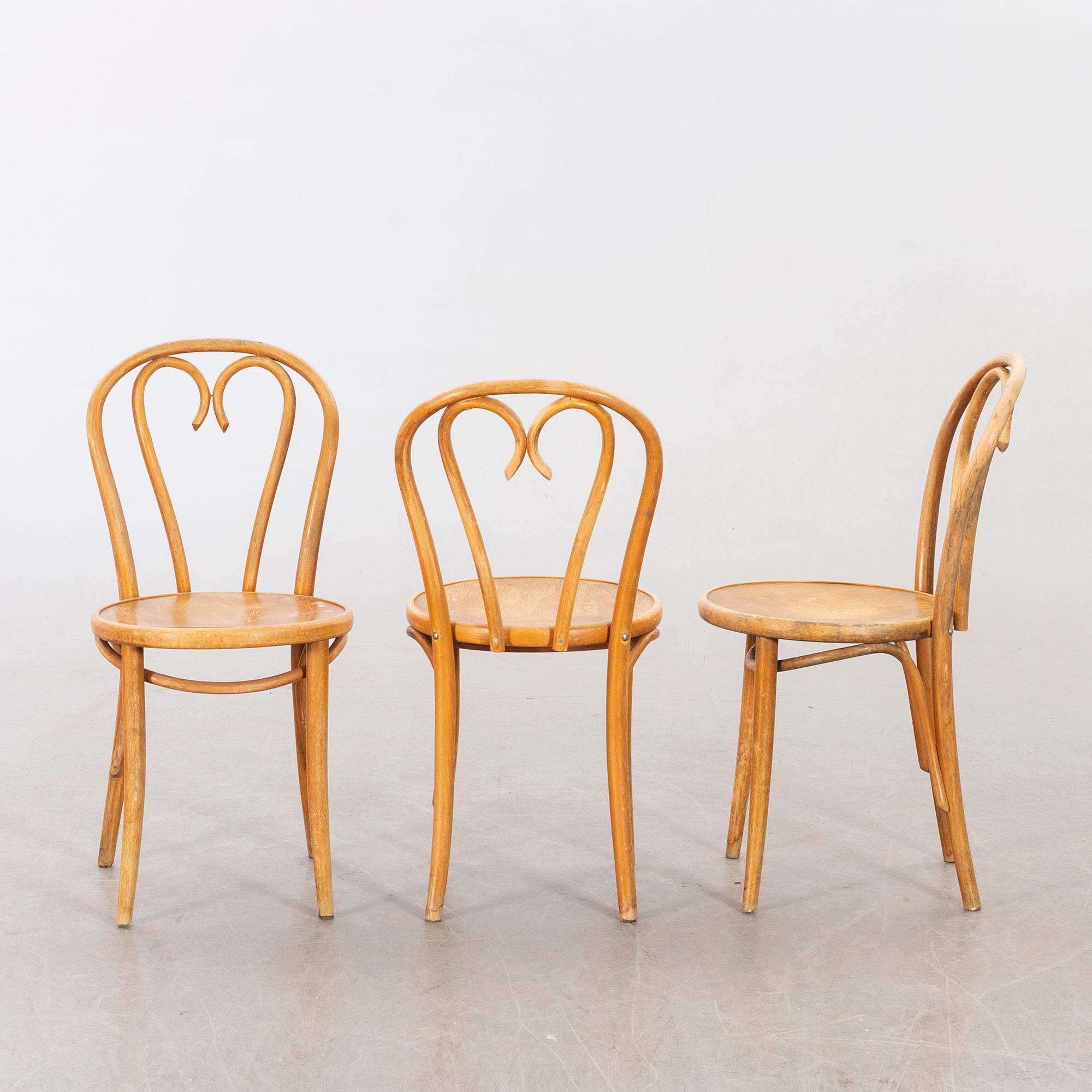 A SET OF SIX BENTWOOD CHAIRS.