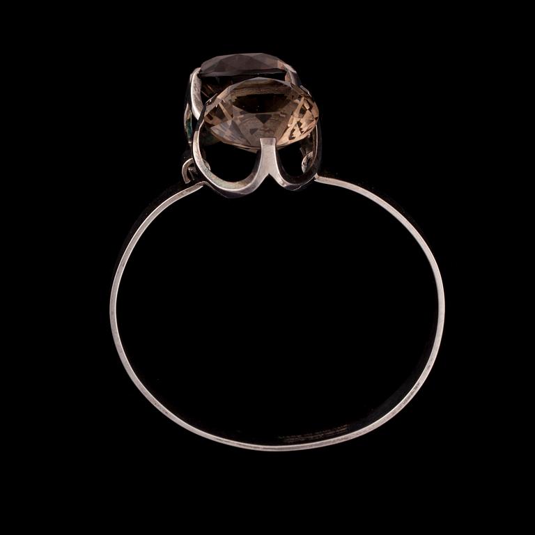 ARMBAND, silver, rökkvarts. Matti Hyvärinen, Åbo 1974. Vikt ca 26,4 g.