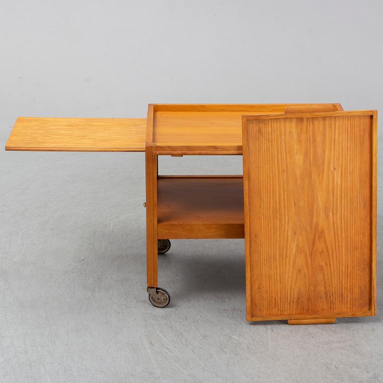 A 1930s/1940s elm veneered trolley.