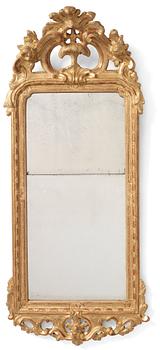 87A. A rococo giltwood mirror by J. Åkerblad (master in Stockholm 1758-99).