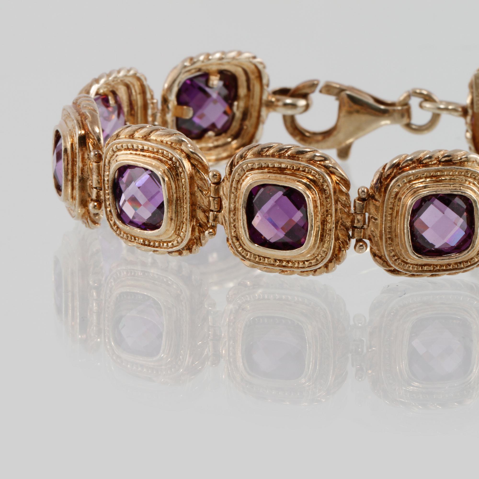 ARMBAND, förgyllt sterlingsilver med lila fasettslipade stenar. Vikt 30 gram.