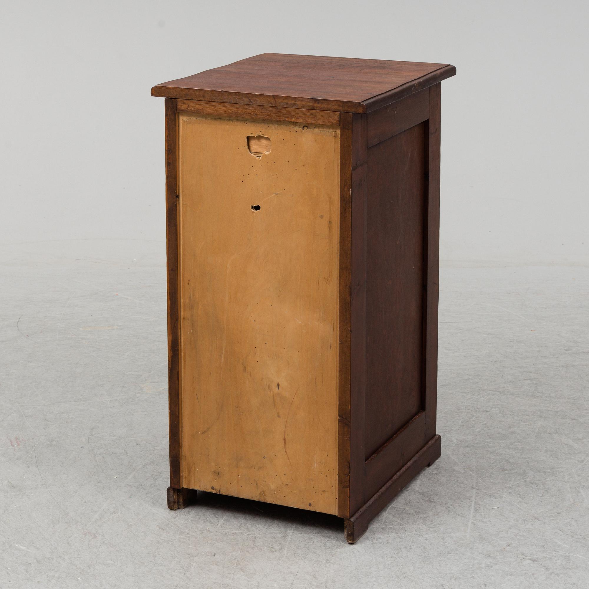 An early 20th Century stained pine office furniture.