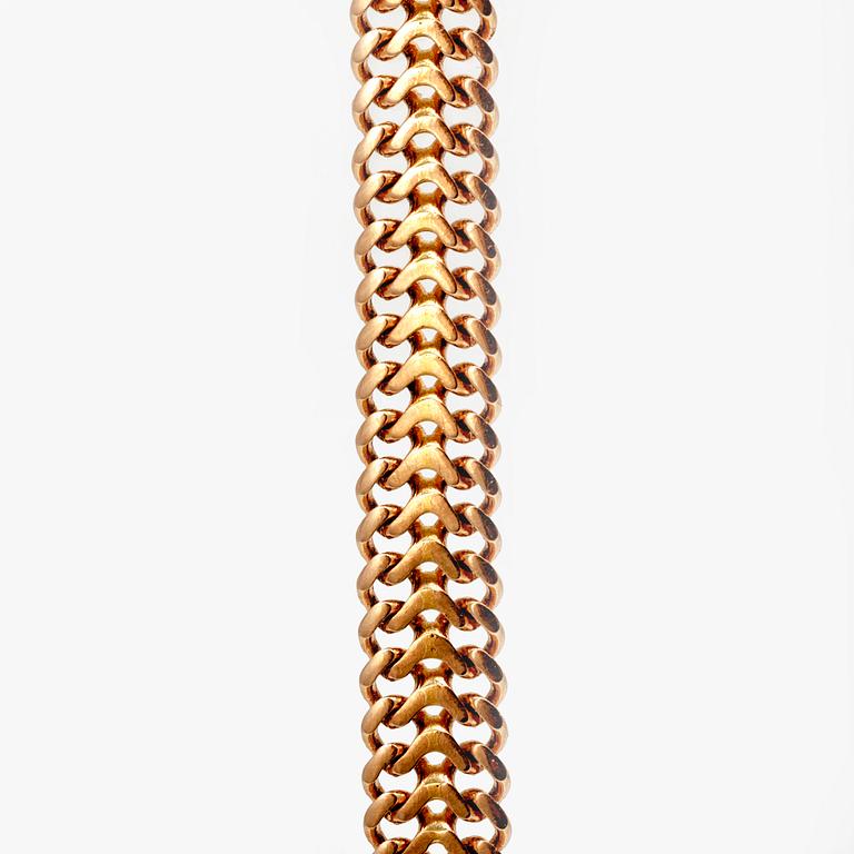 Armlänk, 18K guld, fiskbenslänk.