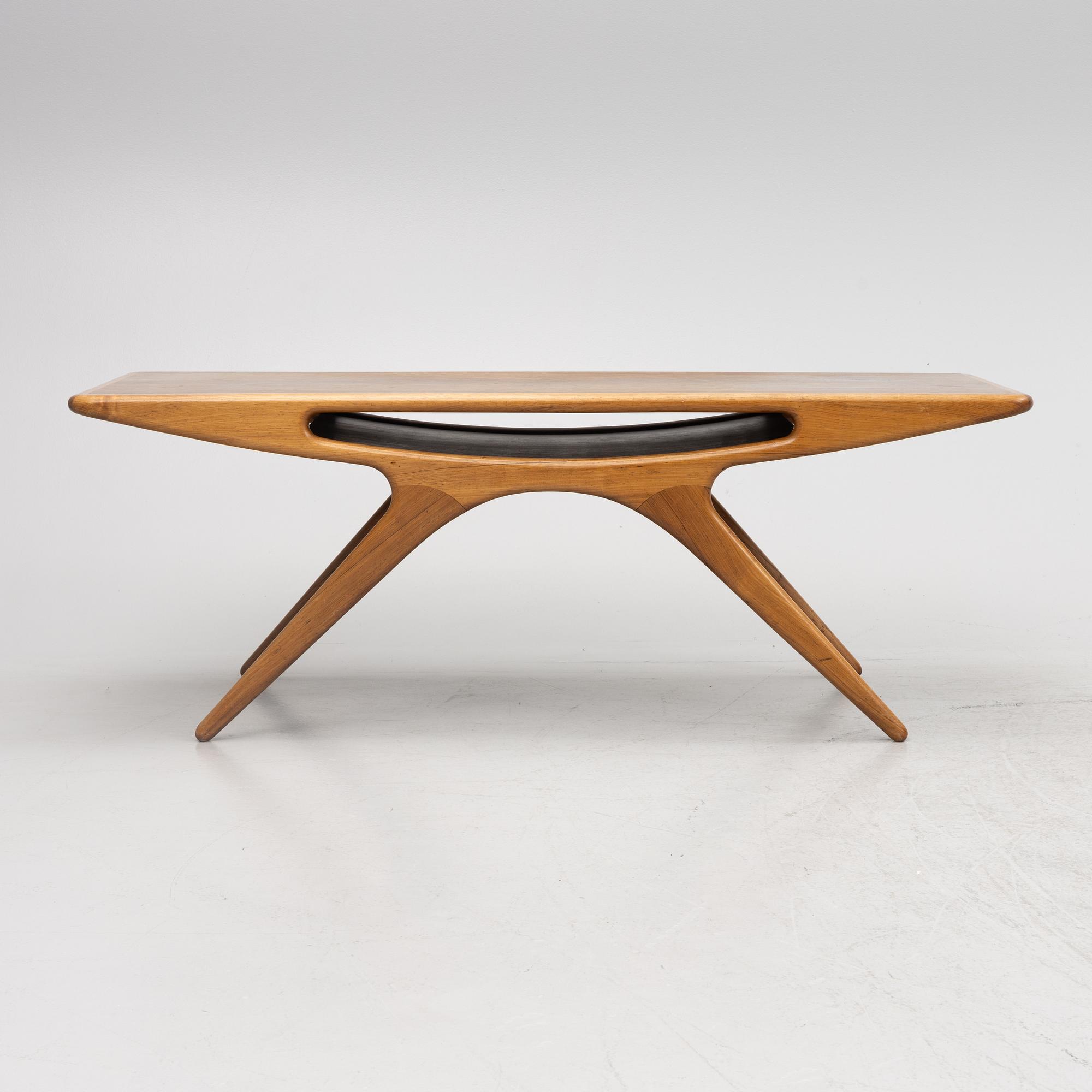 Johannes Andersen, a 'Smile' coffee table, CF Christensen, Silkeborg, Denmark, 1950's/60's.