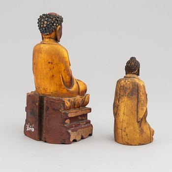 Two gilded and lacquered wooden figures of Buddha, Qing dynasty, 19th Century.