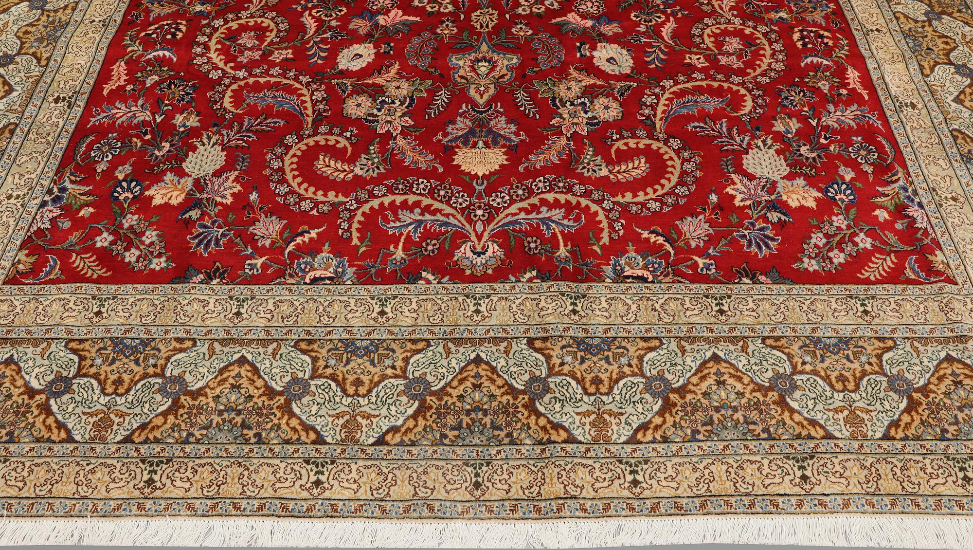 A Keshan carpet, approx. 415 x 300 cm.