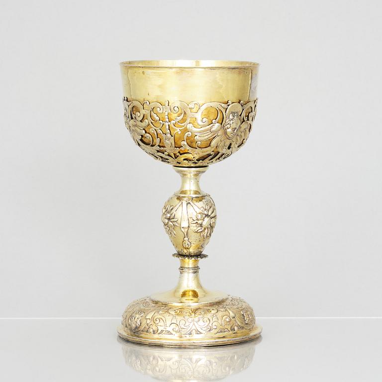 A 17th century silver-gilt cup, marked GM.