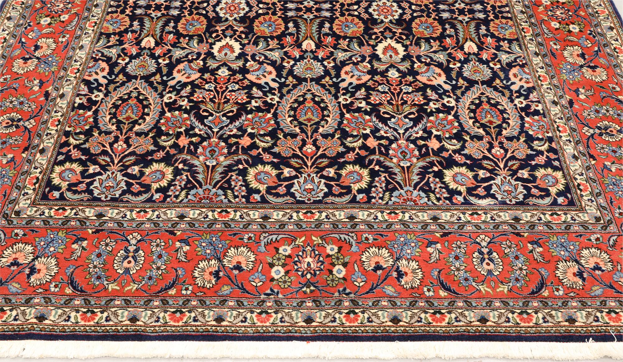 A part silk Sarouk rug, signed, approx. 240 x 208 cm.