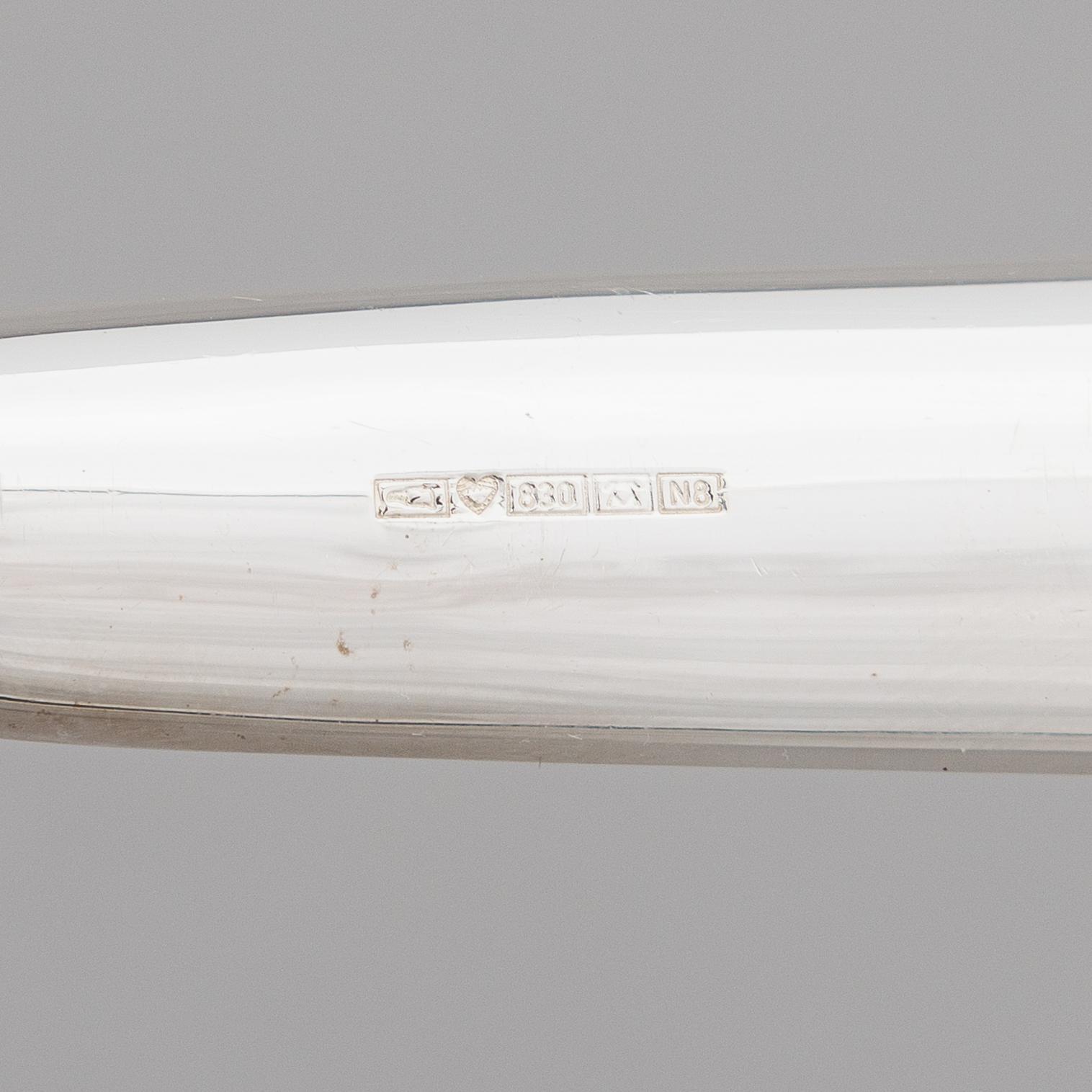 Pekka Piekäinen, a 78-piece set of cutlery in silver and steel, Turku 1990. Designed for the Presidential residence.