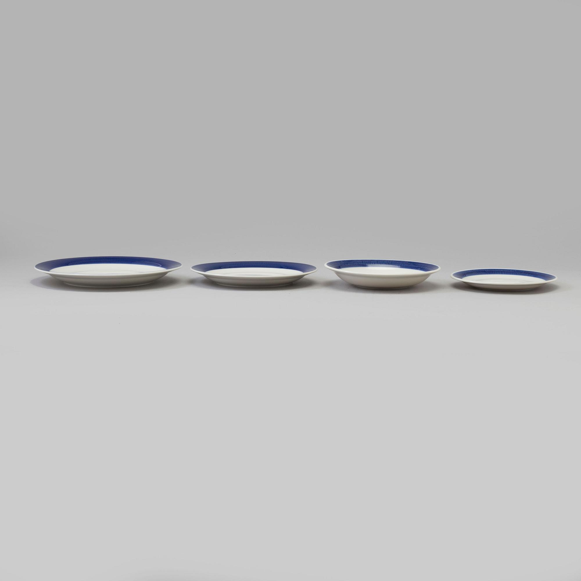 a 51 pcs porcelin dinner service, 'Koka blå', by Hertha Bengtsson, Rörstrand, in production 1956-1988.