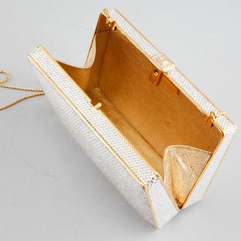 A Judith Leiber handbag.