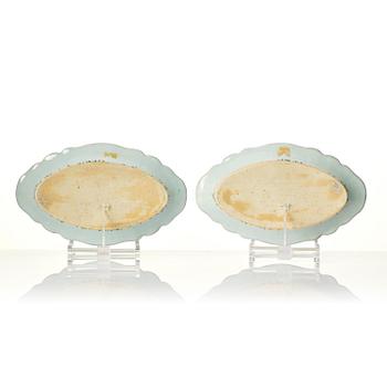 A pair of famille rose 'double peacock' dishes, Qing dynasty, Qianlong (1736-95).