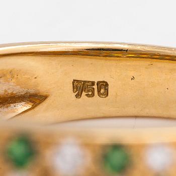 Ring, 18K guld, med pavéinfattade tsavorit granater och briljantslipade diamanter. D.Gallopin & Cie, Geneve.