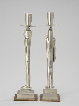 A pair of Edvin Öhrström pewter candle sticks by Svenskt Tenn 1930.