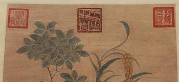 A hanging scroll with flowers and items from the scholars desk, late Qing dynasty (1644-1912).