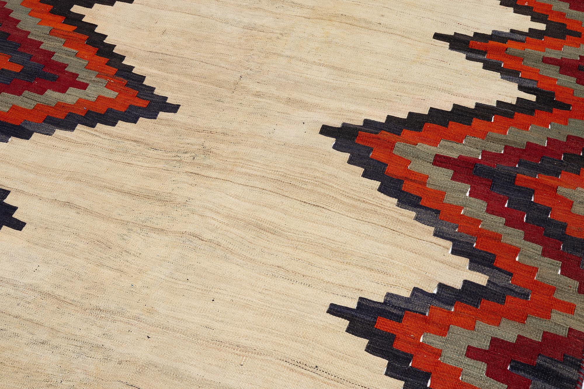 A semi-antique Qashqai kilim, c. 350 x 188 cm.