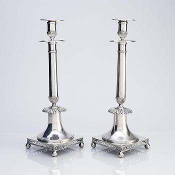 A pair of Swedish early 19th century silver candlesticks, marks of Johan Petter Grönvall, Stockholm 1815.