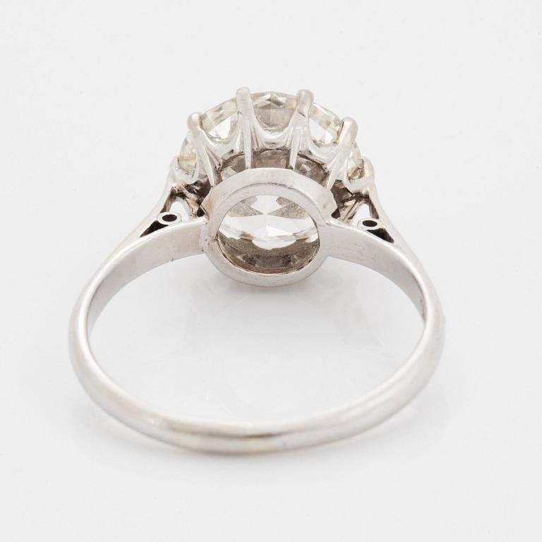 A platinum ring set with an old-cut diamond ca 3.30 cts quality ca J/K vs.