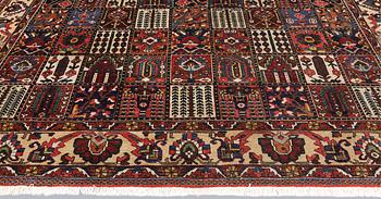 A semi-antique Baktiari carpet, approx. 360 x 308 cm.