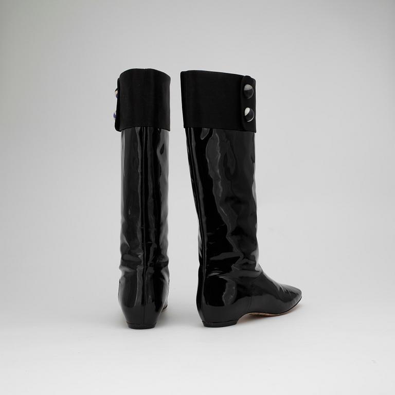 PUCCI, a pair of black patent leather boots.