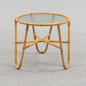 A second half of the 20th century sofa, table and armchairs.