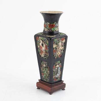 A Chinese famille noire pierced vase, Qing dynasty, 19th century.