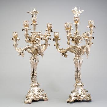 A pair of Neo-Rococo silver candelabra by Gustaf Möllenborg, Stockholm, 1845. Total weight ca 5920 grams.