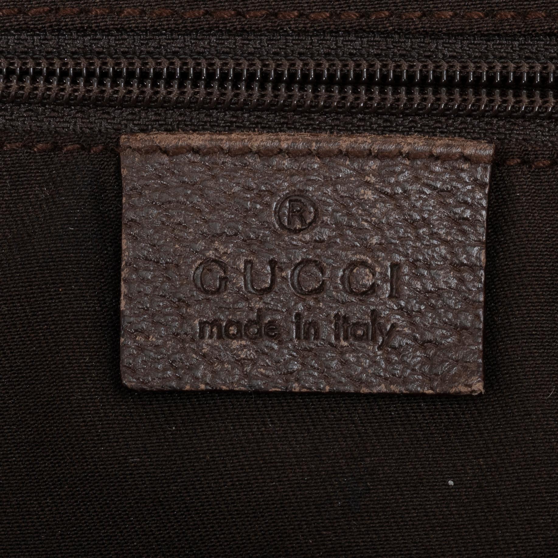 Gucci, a canvas and leather bag.