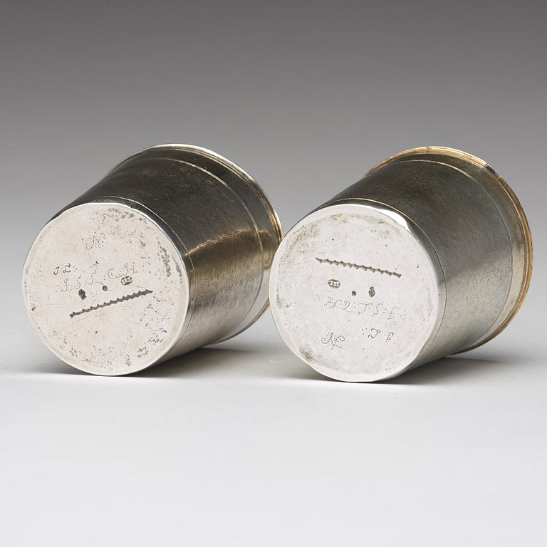 A matched pair of German 17th century parcel-gilt silver, Augsburg (1627-1665).