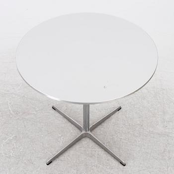 Arne Jacobsen, A coffee table, by Fritz Hansen, dated 2000.