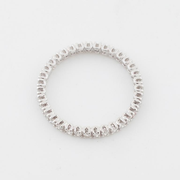 A brilliant cut diamond ring.