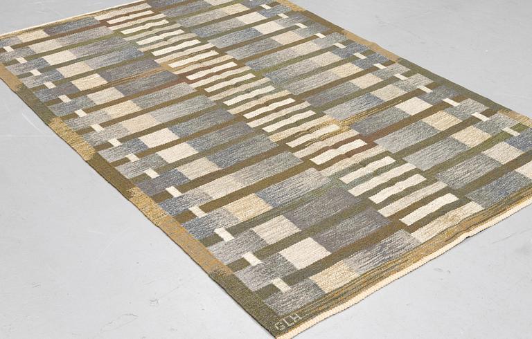 Margareta Grandin-Nettles, a carpet, flat weave, ca 249 x 167 cm, signed GLH MG.