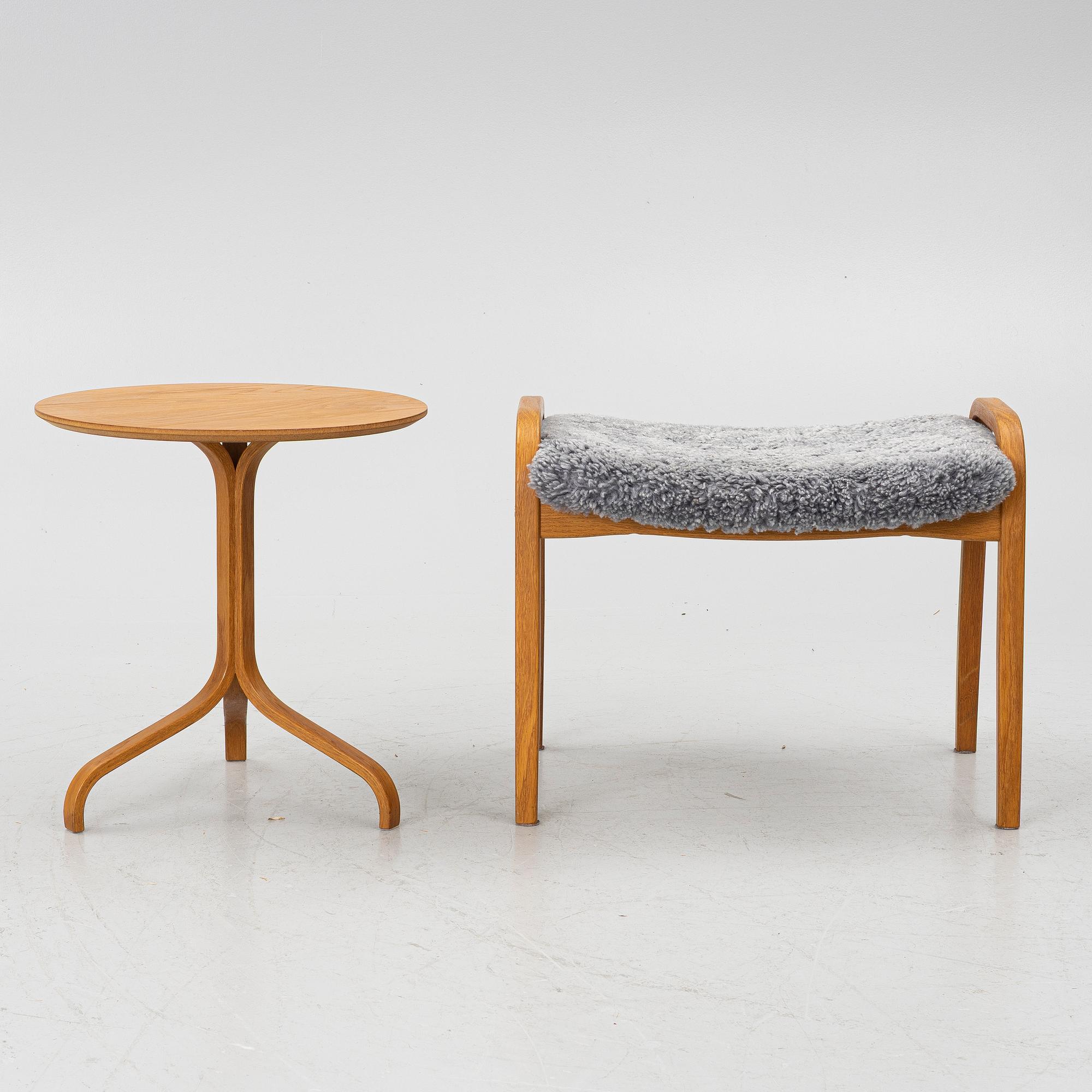 Yngve Ekström, A pair of armchairs, a footstool, “Lamino”, and a side table, Swedese, 2000s.