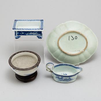 A blue and white bowl, sauceboat, pot and a canton dish, Qing dynasty, 19th century.