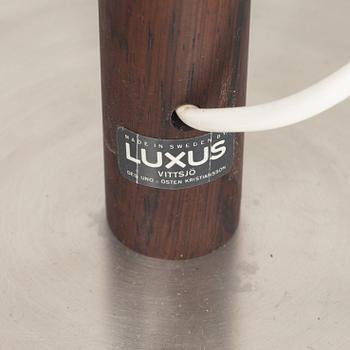 Uno & Östen Kristiansson, a pair of rosewood veneered floor lights, Luxus, Vittsjö, 1960's.