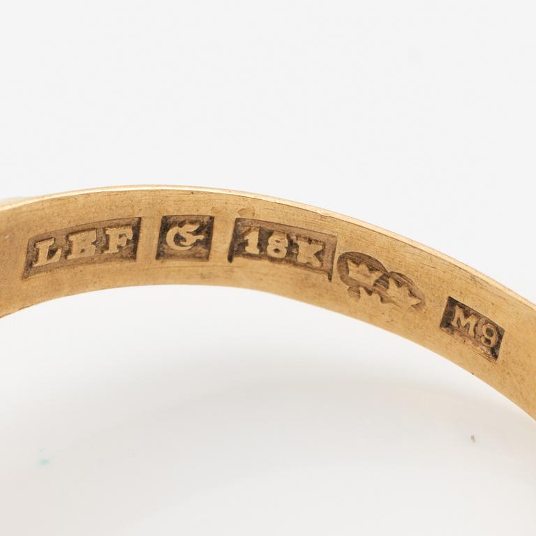 Ring 18K guld med syntetisk grön spinell.