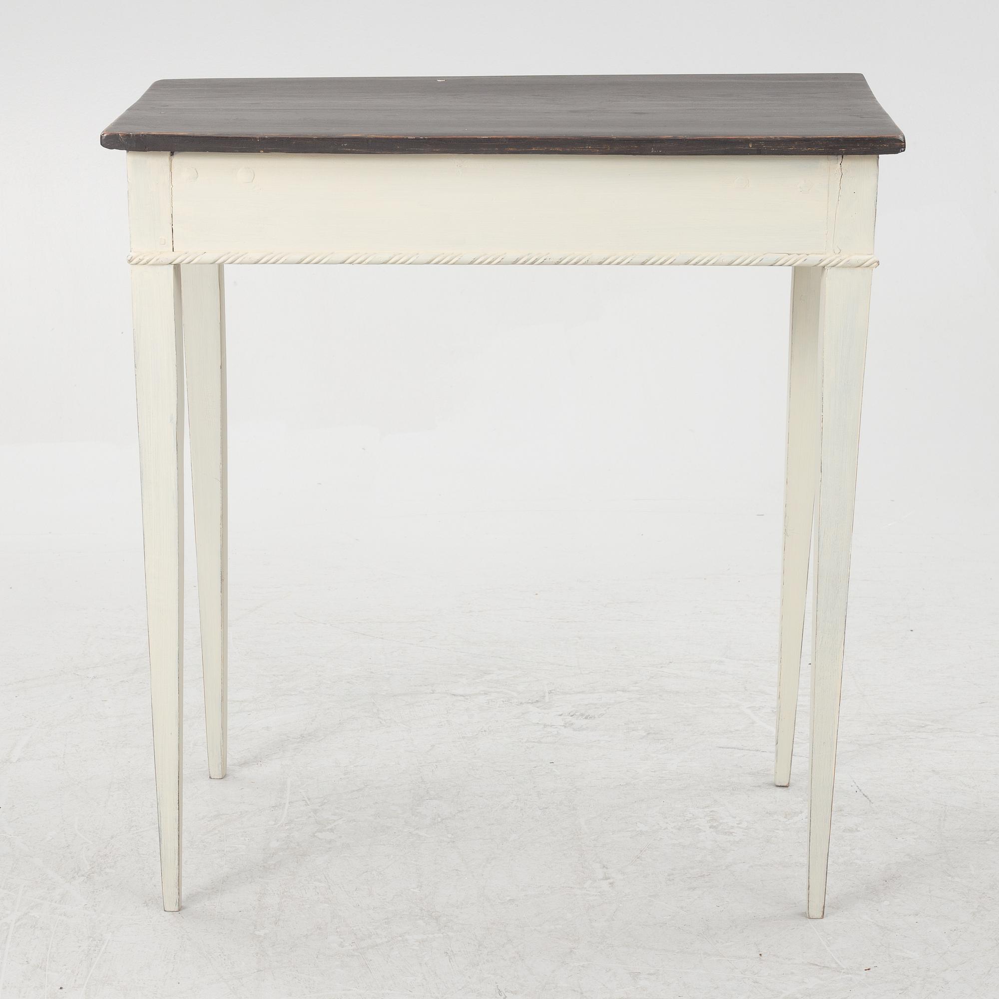 A table, late 19th Century.