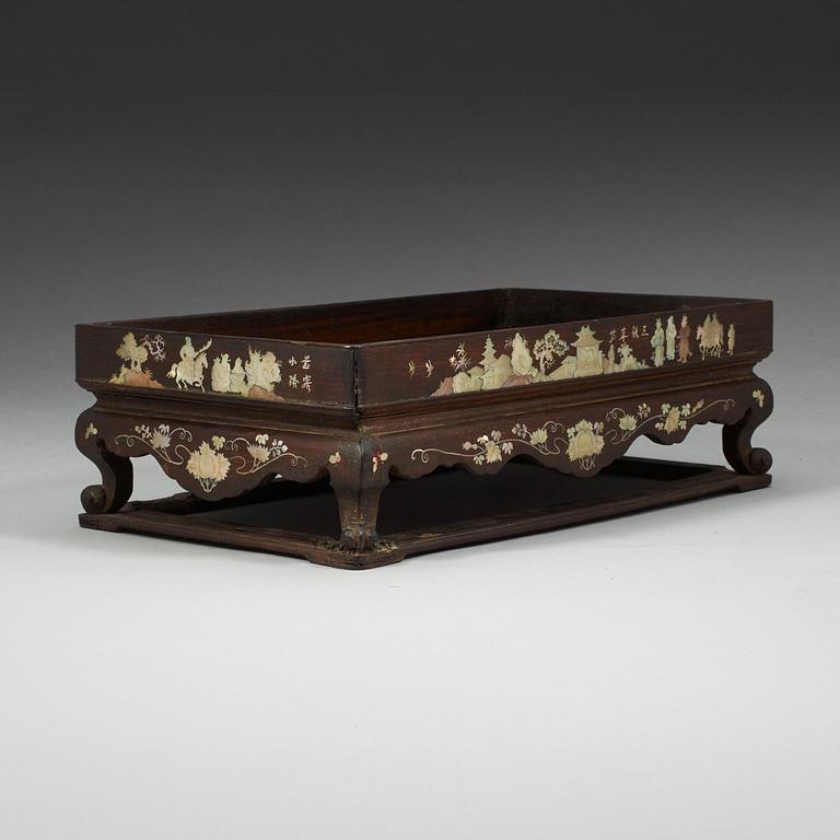 A wooden opium tray with inlays of mother-of-pearl, Qing dynasty, 19th Century.