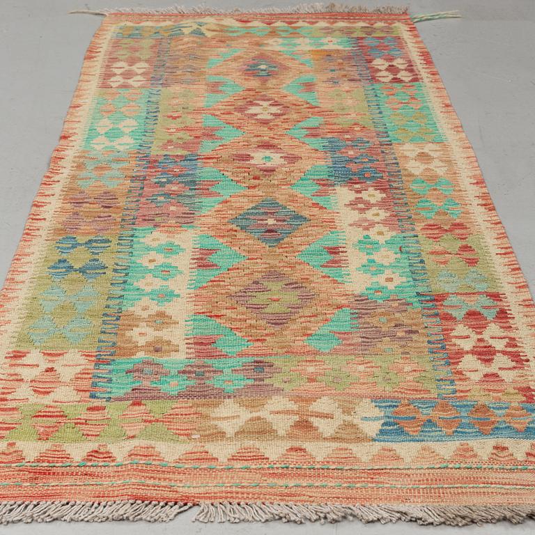 A RUG, kilim 192 x 77 cm.