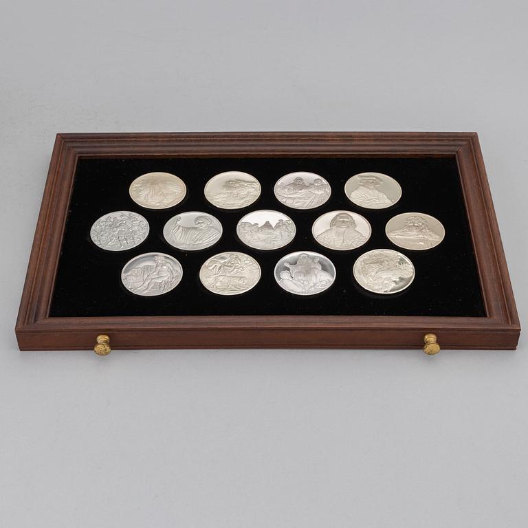 A set of 50 Sterling silver medals from Franklin Mint.