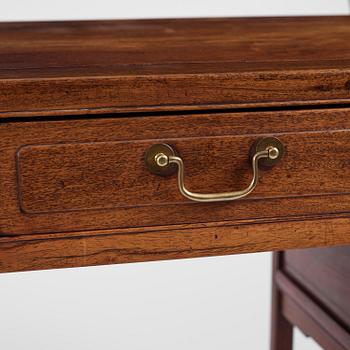 A six-drawer 'jichimu' pedestal partners desk, late Qing dynasty/early 20th century.