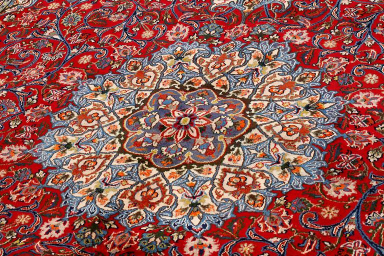 A Semnan rug, signed, 388 x285 cm.