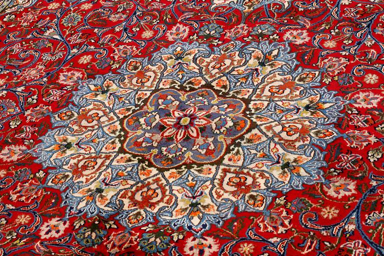 A Semnan rug, signed, 388 x285 cm.