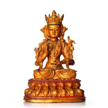 855. A gilt lacquer bronze figure of Avalokiteshvara, Ming dynasty (1368-1644).