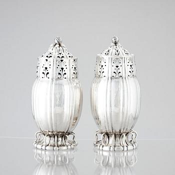 Georg Jensen, a pair of sugar casters, Copenhagen ca 1915-1919, 830/1000 silver, design nr 4.